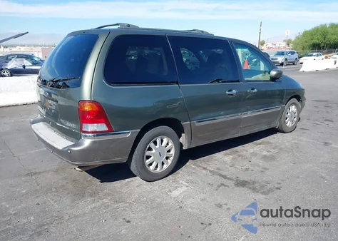 2003 Ford Windstar Limited из США, поврежденный, VIN 2FMDA584X3BA03540